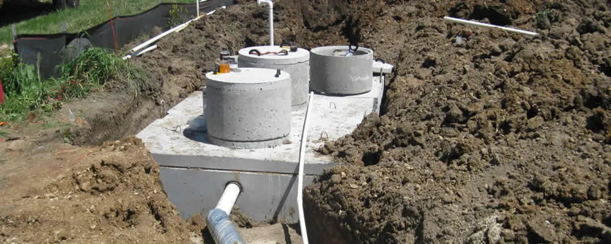 Septic system repair and installation site with tank access ports in Fort Lauderdale, FL